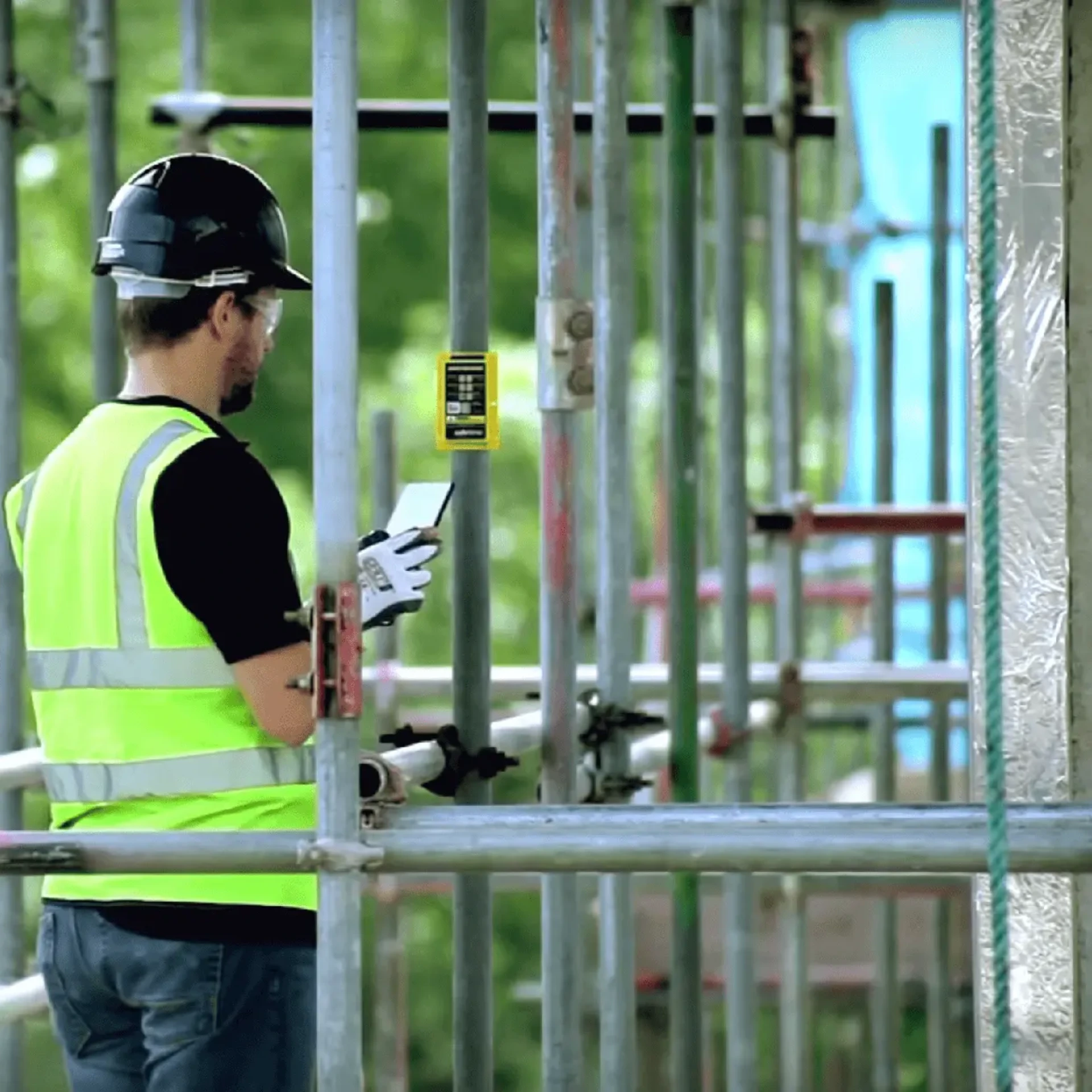 Inspector scanning an Inspect7® scaffold inspection label during a digital asset inspection.